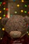 Teddy bear on christmas garland background