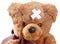 Teddy Bear with Crossed Adhesive Bandages on Head