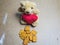 Teddy bear with a heart that loves bread
