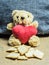 Teddy bear with a heart that loves bread