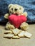 Teddy bear with a heart that loves bread