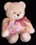 Teddy bear with lily flower