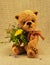 Teddy-bear Misha with flowers