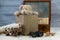 Teddy bear with old book, post box with antique letters and old map with binoculars