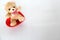 teddy bear and pink hearts on white background, valentine`s day, advertising baner