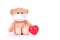 Teddy bear and red heart is wearing a PM 2.5 pollution masks and protect virus on white background. Health care concept