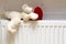 Teddy bear rying radiator