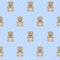 Teddy Bear seamless pattern on baby blue polka dots background.