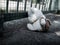 Teddy Bear sitting on Cement Vintage Styles Symbols Abuse Child kid,Grief Domestic,Sad,Violence Emotion scared,Depressed,Broken