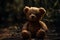 Teddy bear sitting on a wooden floor in the dark Ai generative