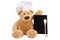 Teddy bear with slate board.