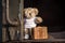 Teddy bear with suitcase says goodbye and goes on vacation by train