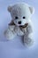 Teddy Bear toy alone with dark blue background. Lonely concept, lost child