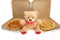 A Teddy bear with two pizzas