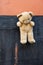 Teddy bear on a two tone wall
