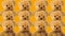 Teddy bears on a color background. A crowd of brown bears. Favorite children`s soft toy.