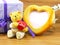 Teddy brown bear and red heart shape with heart shape photo frame