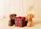 Teedy bear with gift box for christmas decoration on wooden back