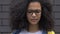 Teen biracial girl suffers teasing about clothes and hair, appearance bullying