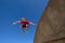 Teen Boy Jumping Blue Sky