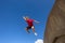 Teen Boy Jumping Blue Sky