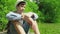 teen boy sitting on a pier near the lake and thinking, relaxes at summer, connect with nature