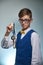 Teen boy student in glasses with a silver medal