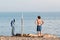 Teen boy swimming in lake erie