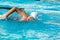 Teen boy at swimming practice.