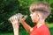 Teen boy with turtle outdoor