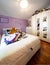 Teen boys bedroom with many plush and parquet