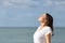 Teen breathing fresh air on the beach a sunny day