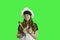 Teen in chef apron and hat green screen