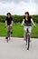 Teen couple riding bikes