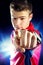 Teen fitness boy pointing with finger.