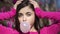 Teen girl blowing bubblegum bubble