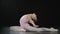 Teen girl child kid teenager gymnast doing backbend exercises in dance class athletic lady stretching in gym flexible