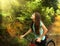 Teen girl cycling through vietnam jungle hill