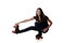 Teen girl doing shoot the duck roller skate move