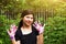 Teen girl with garden gloves work on gardening