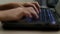 Teen girl hands on laptop keyboard typing