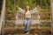 teen girl having fun on playground. childhood happiness. relax in park. summertime activity.