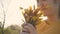 Teen girl holding bouquet of yellow tulips