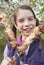 Teen girl holding grilled chickens