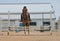 Teen girl on a horse jumping rails