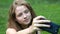 Teen girl making selfie with cellphone