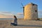 Teen girl and Old windmill ai Gyra beach