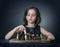Teen girl playing chess