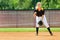 Teen girl playing softball