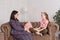 Teen girl on reception at the psychotherapist. Psychotherapy session for children. The psychologist works with the patient. Girl